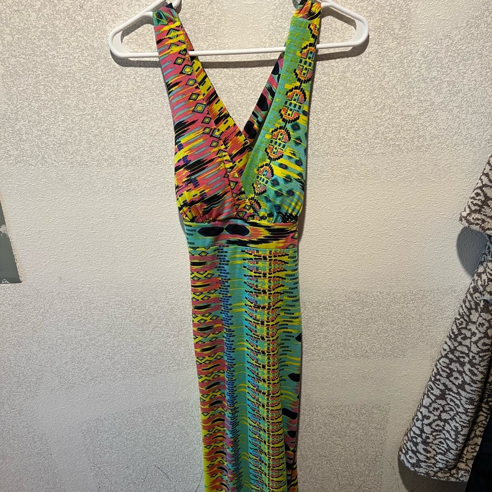 The brand of the dress is no boundaries. The size of it is a medium (7-9)